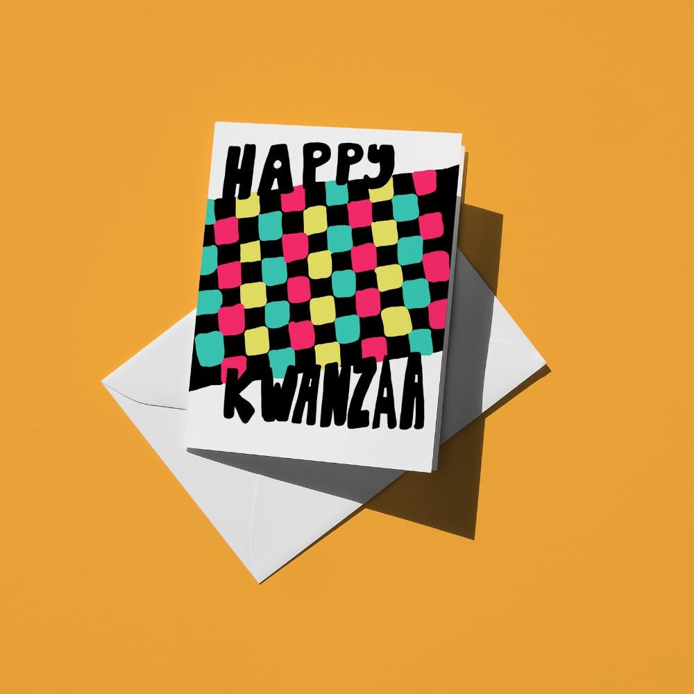 "Happy Kwanzaa" above a woven mkeka mat in pink, green, yellow and teal checks