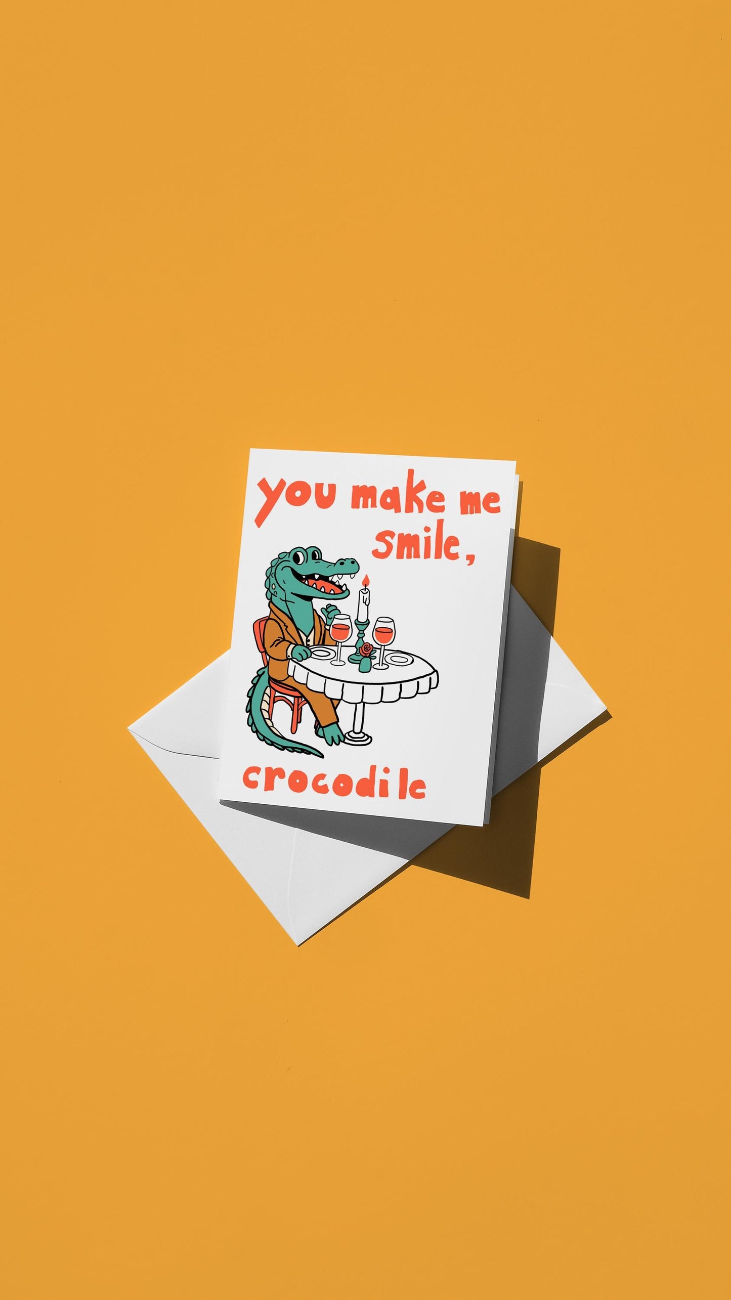 Hand-drawn illustration of a crocodile sitting at a table with the message "you make me smile, crocodile"