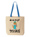 Natural canvas tote bag with blue handles, printed with a 1960s-style woman holding an oversized cigarette and the words oh no no girl, desire is the root of all suffering