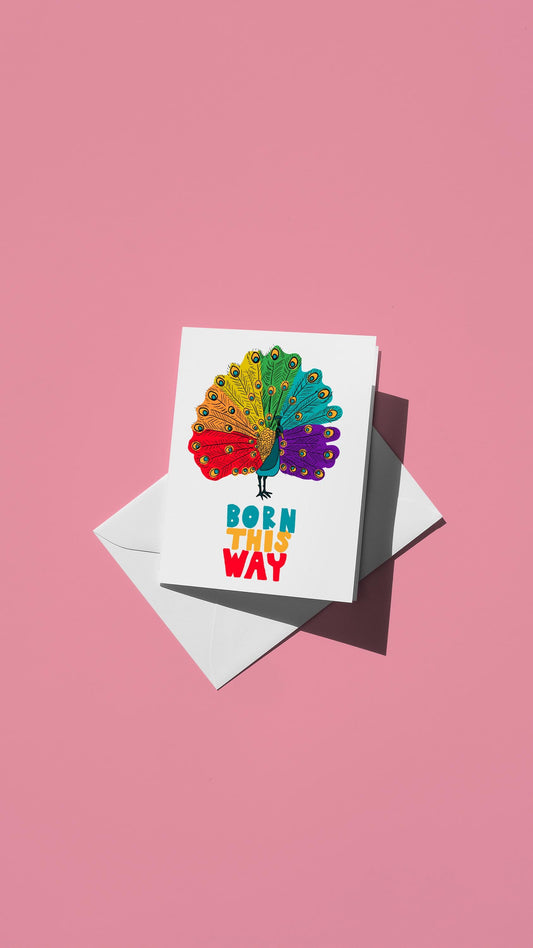 Hand-drawn illustration of a peacock with rainbow feathers and the message "BORN THIS WAY"
