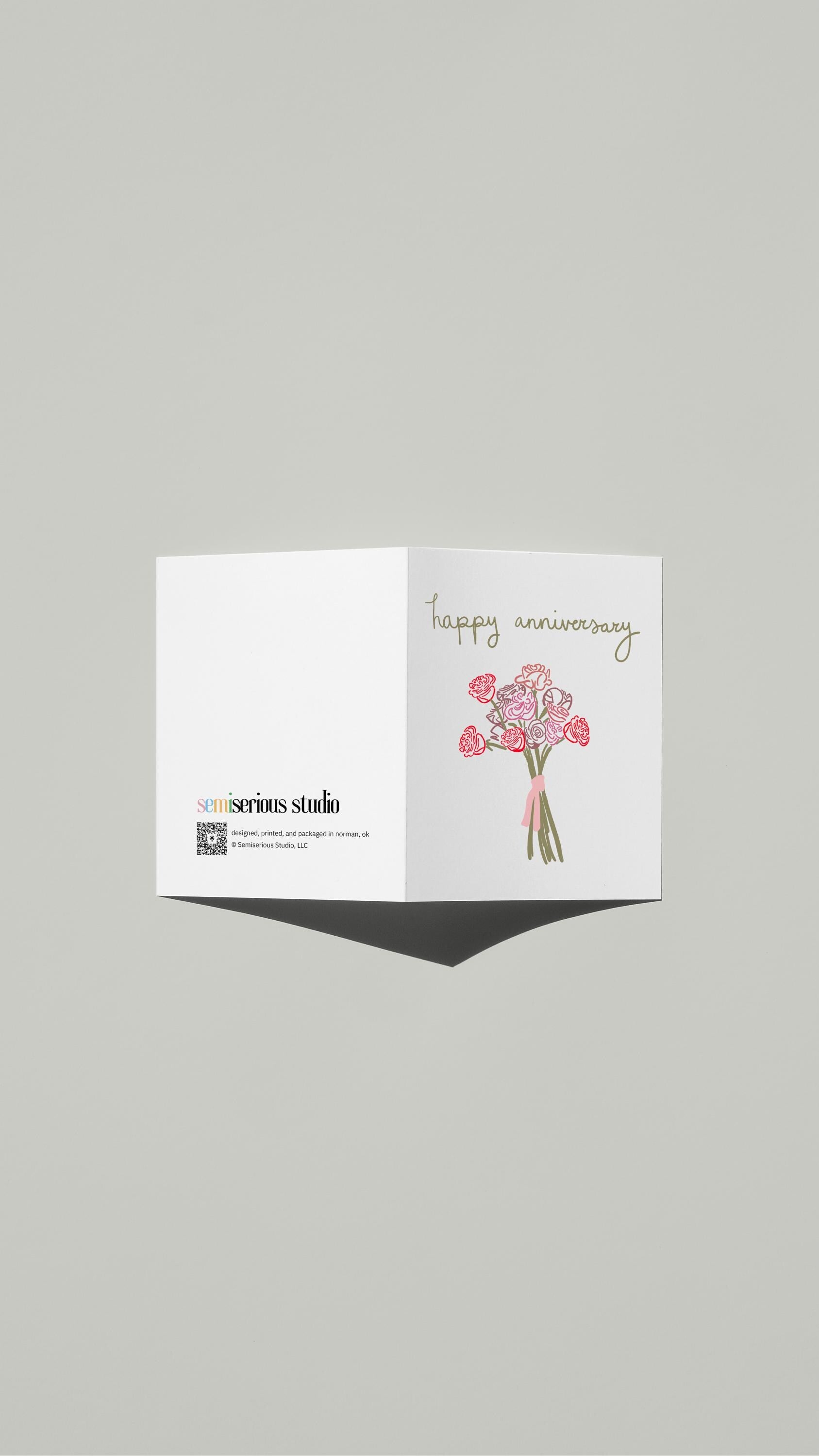 Bouquet of Roses Anniversary card standing open, showing the front artwork and the Semiserious Studio logo on the back