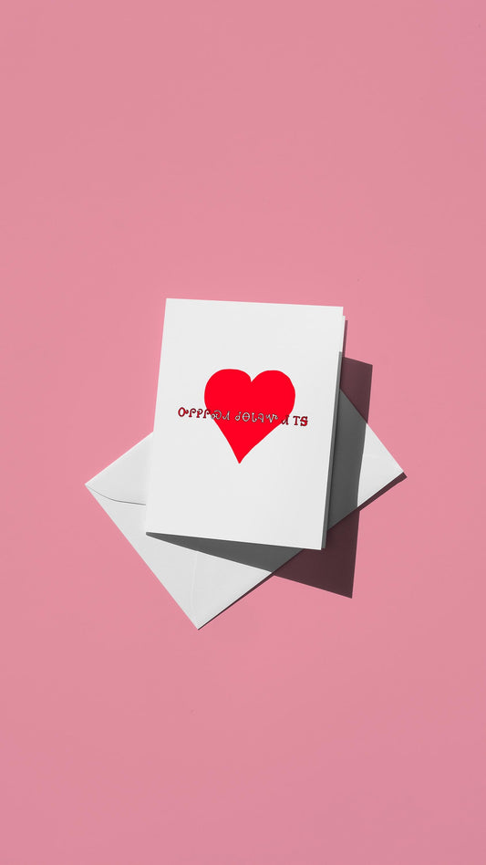 Hand-drawn illustration of a simple red heart with the message "Happy Valentine's Day" written in Cherokee syllabary