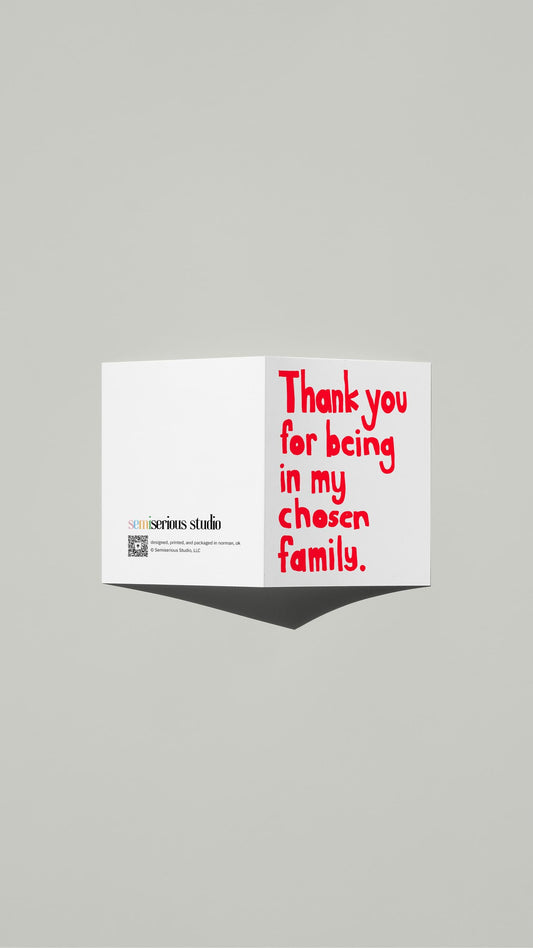 Chosen Family Thank You Pride card standing open, showing the front artwork and the Semiserious Studio logo on the back