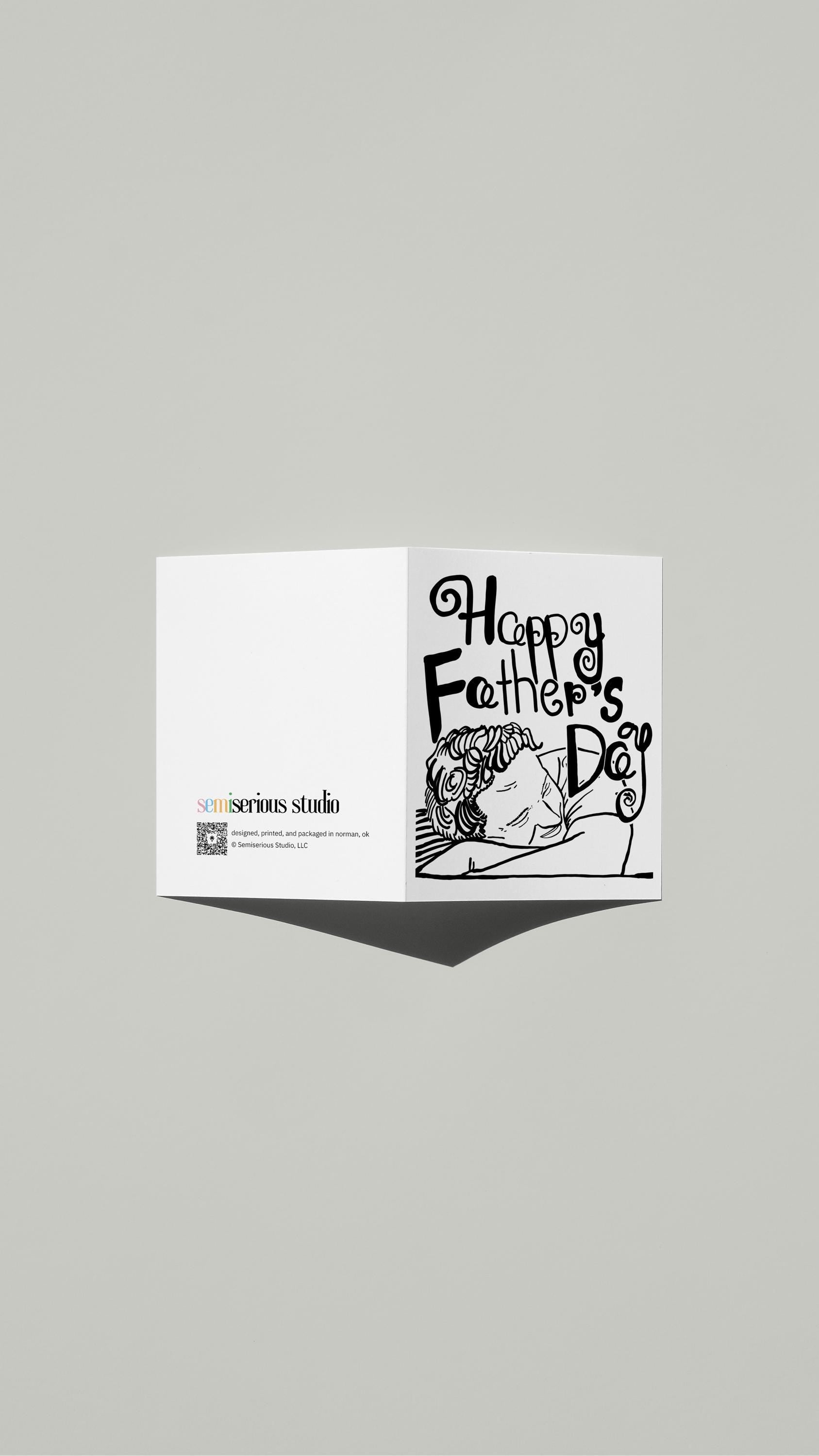 Classic Black & White Father's Day card standing open, showing the front artwork and the Semiserious Studio logo on the back