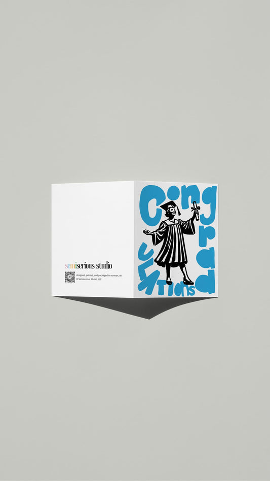 ConGRADulations Graduation card standing open, showing the front artwork and the Semiserious Studio logo on the back