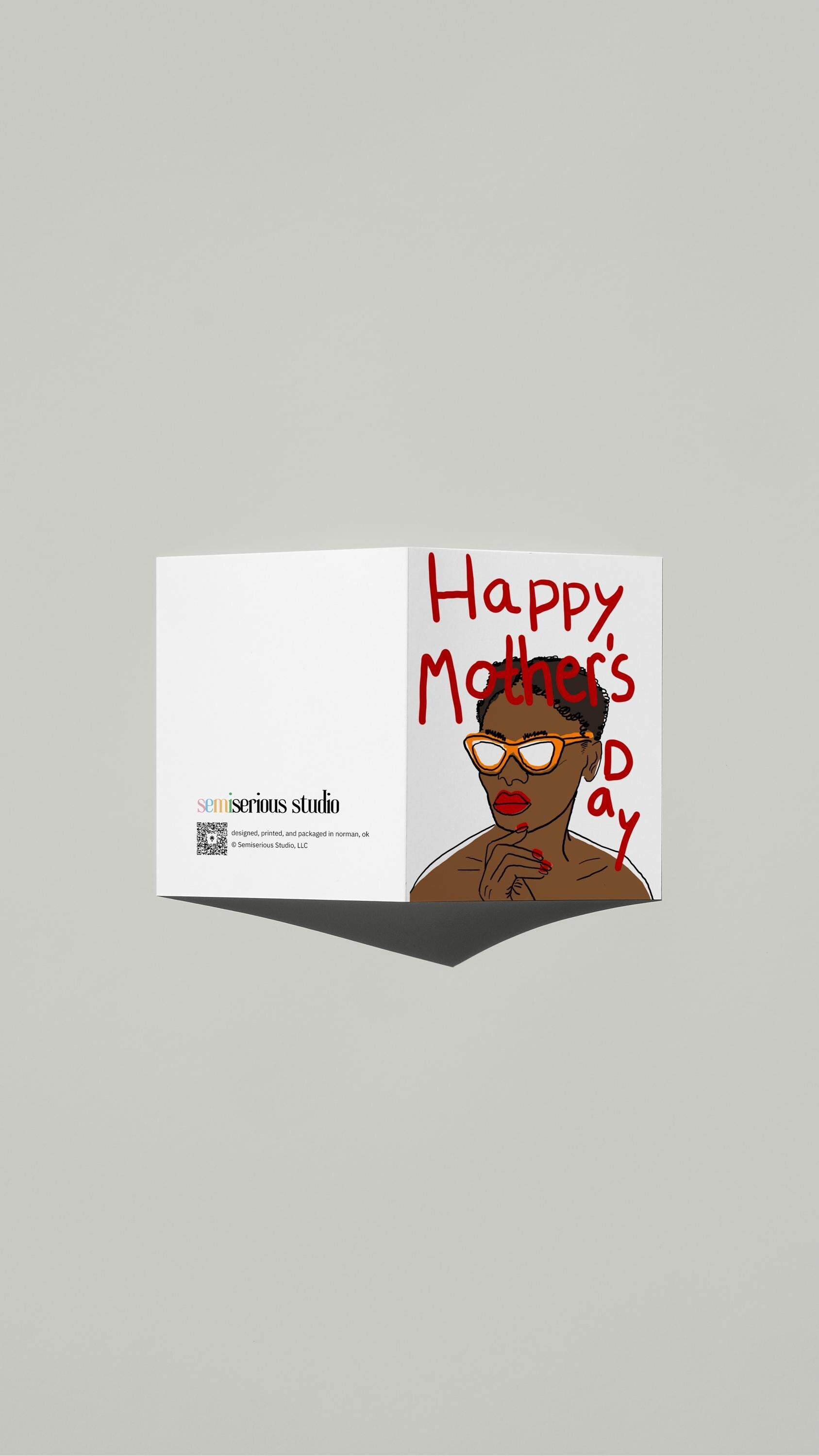 Cool Mom in Sunglasses Mother's Day card standing open, showing the front artwork and the Semiserious Studio logo on the back