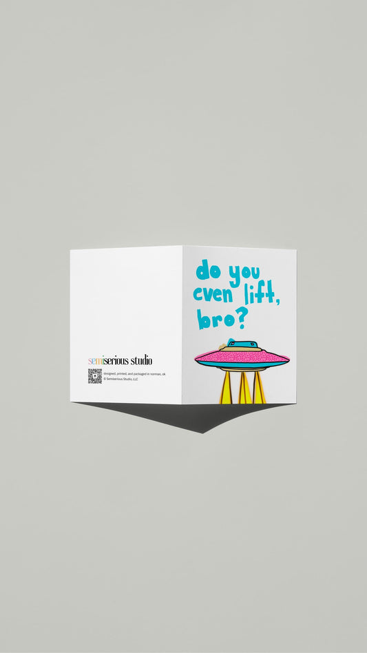 Do You Even Lift UFO card standing open, showing the front artwork and the Semiserious Studio logo on the back