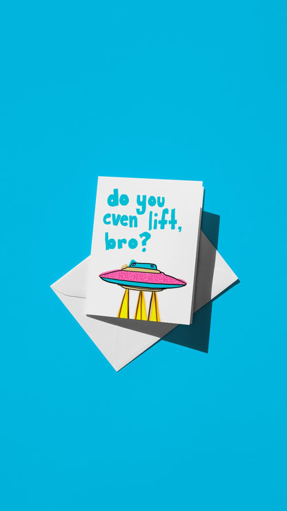 Hand-drawn illustration of a UFO with tractor beams with the message "do you even lift, bro?"