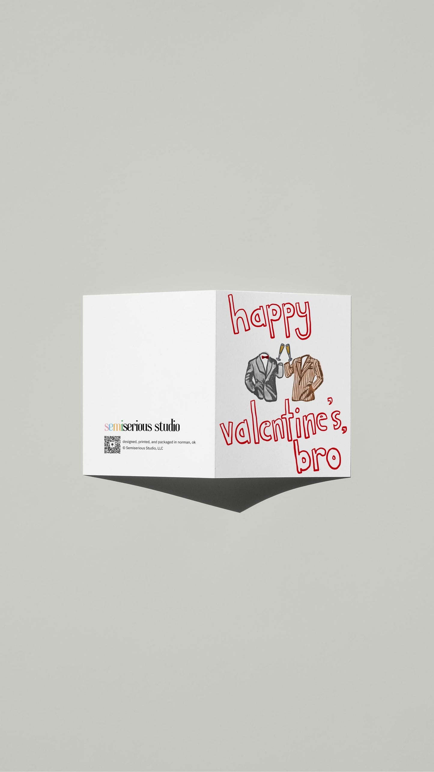 Happy Valentine's Bro card standing open, showing the front artwork and the Semiserious Studio logo on the back