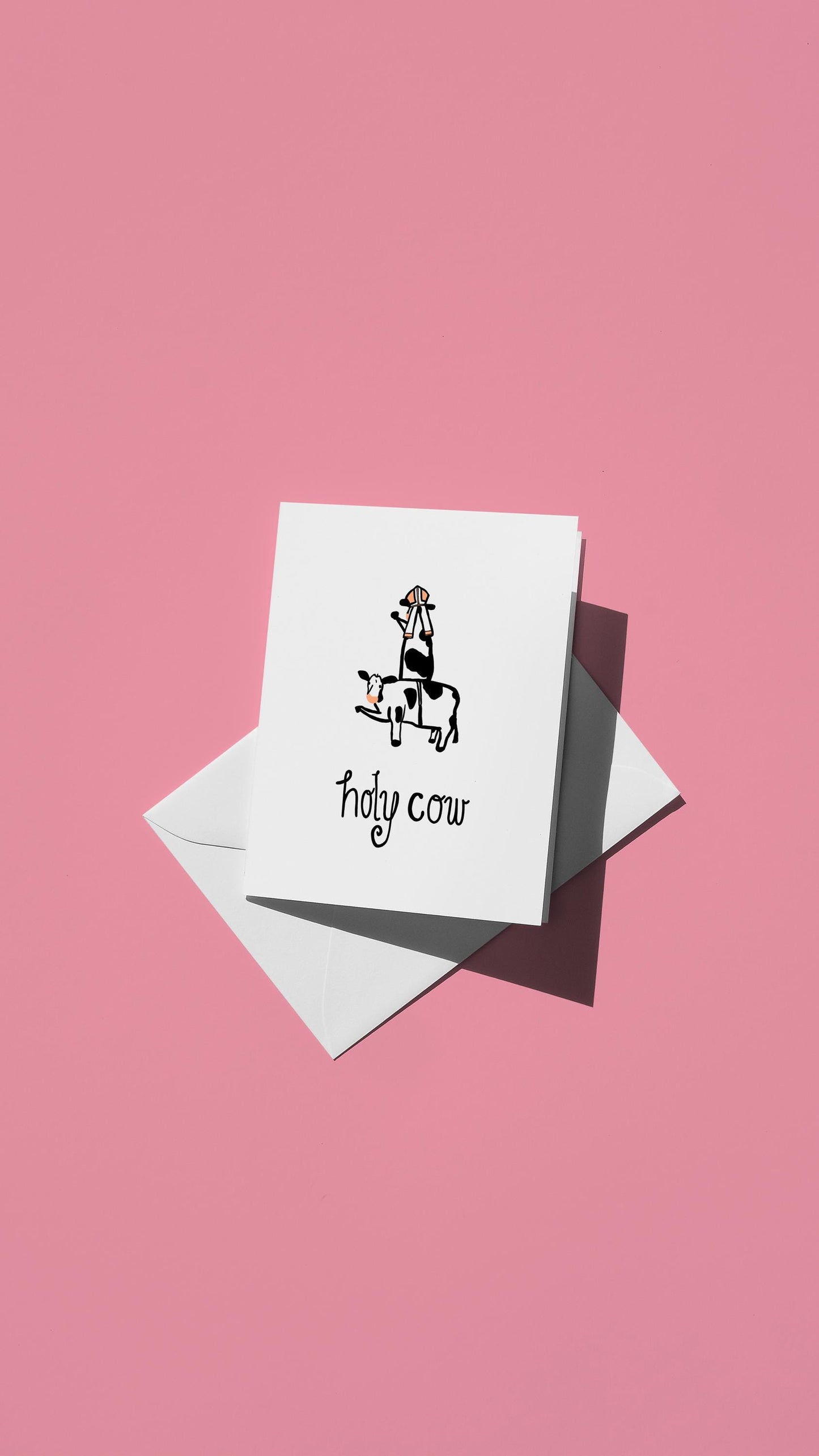 Hand-drawn illustration of a cow Pope riding another cow with the message "holy cow"