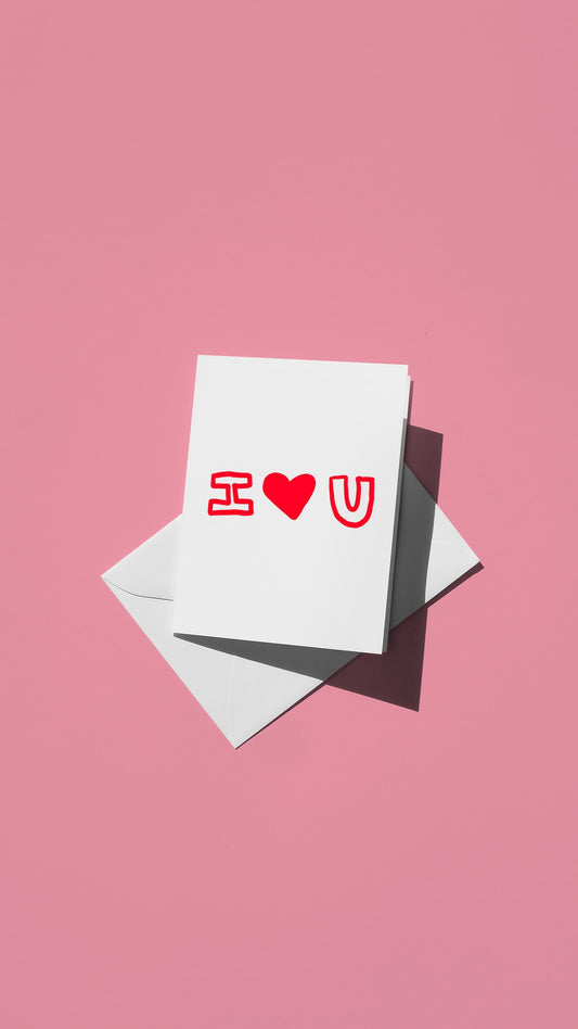 Hand-drawn illustration of "I ♥️ U" in red