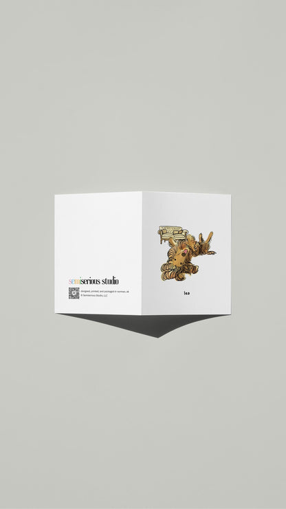 Leo Afghan Hound Birthday card standing open, showing the front artwork and the Semiserious Studio logo on the back