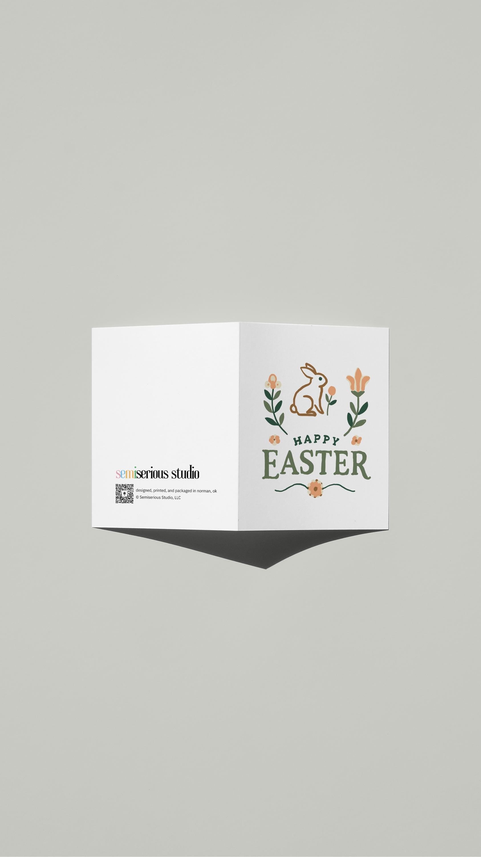 Minimalist Floral Easter card standing open, showing the front artwork and the Semiserious Studio logo on the back