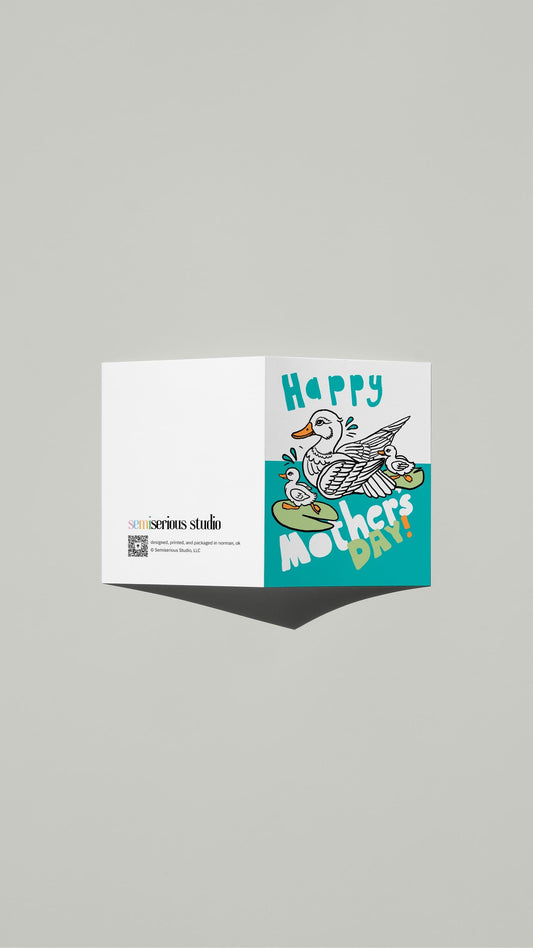Mother Duck & Ducklings Mother's Day card standing open, showing the front artwork and the Semiserious Studio logo on the
