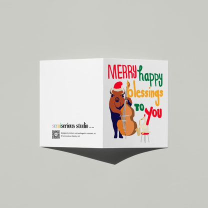 Musical Bison Christmas card standing open, showing the front artwork and the Semiserious Studio logo on the back