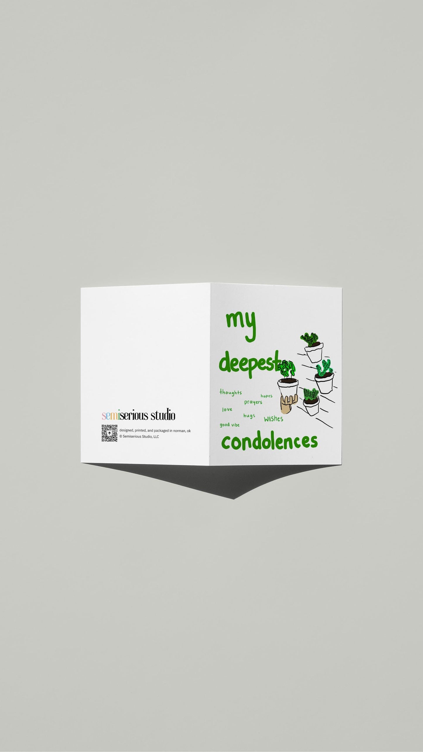 My Deepest Condolences Sympathy card standing open, showing the front artwork and the Semiserious Studio logo on the back