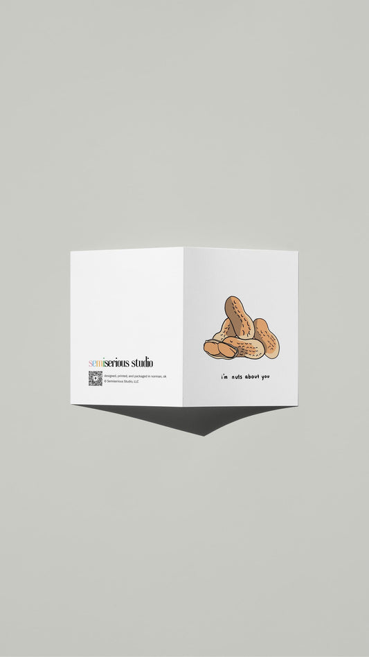 Nuts About You Valentine card standing open, showing the front artwork and the Semiserious Studio logo on the back