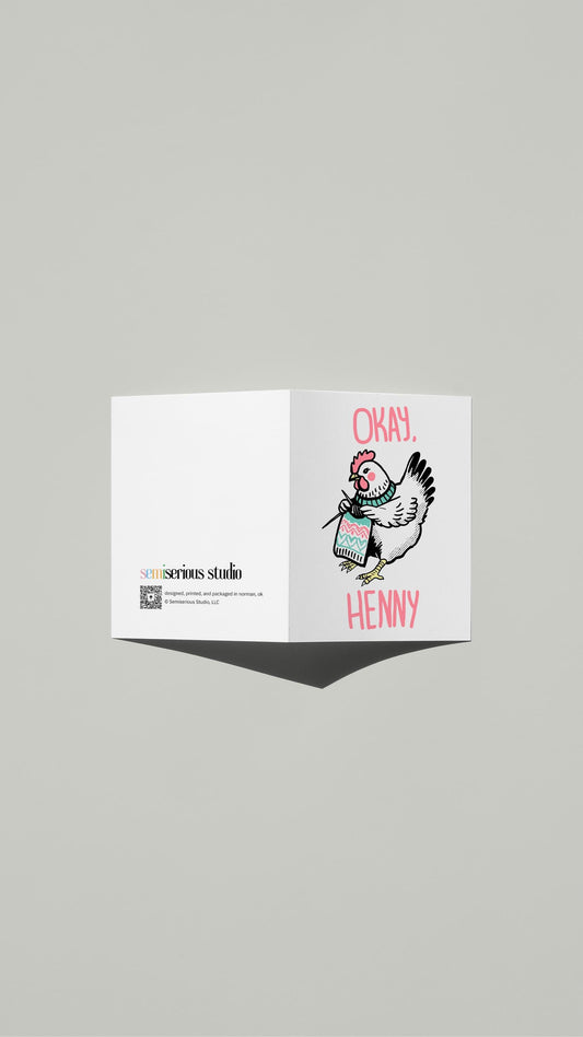 Okay Henny You Sew Girl card standing open, showing the front artwork and the Semiserious Studio logo on the back
