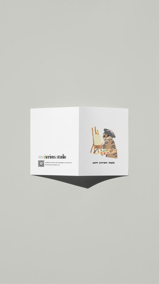 Pisces Ragdoll Cat Painting Birthday card standing open, showing the front artwork and the Semiserious Studio logo on the