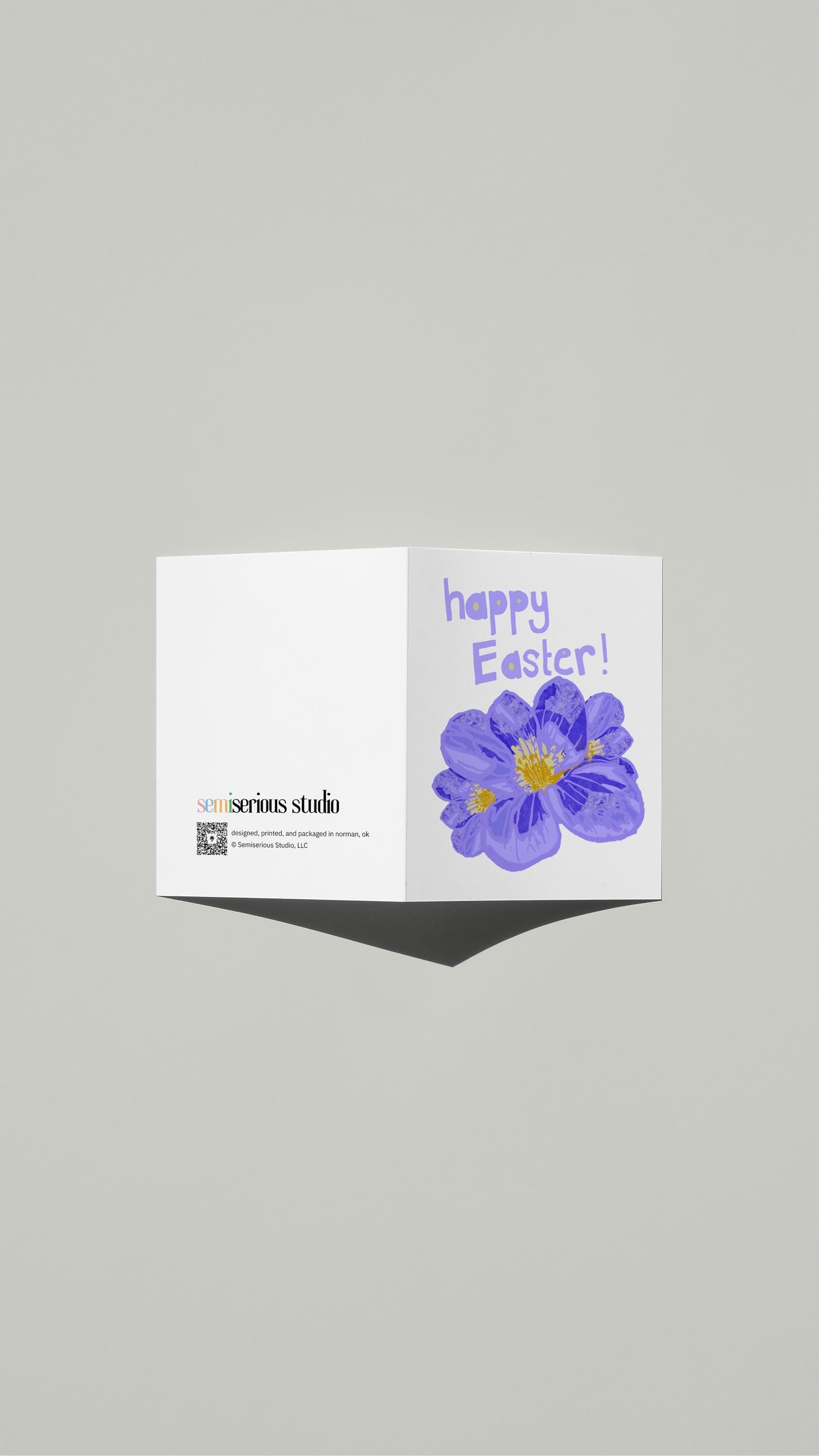 Purple Floral Easter card standing open, showing the front artwork and the Semiserious Studio logo on the back