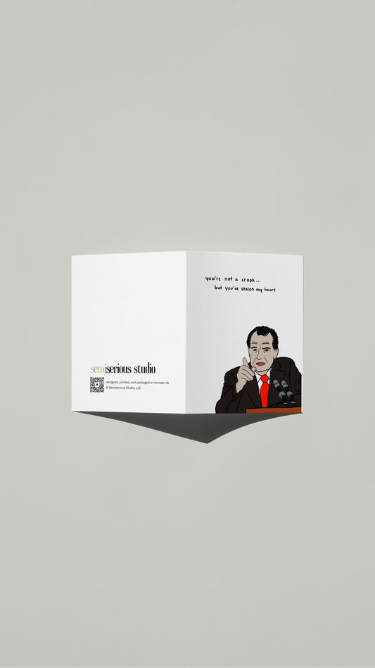 Richard Nixon Valentine card standing open, showing the front artwork and the Semiserious Studio logo on the back