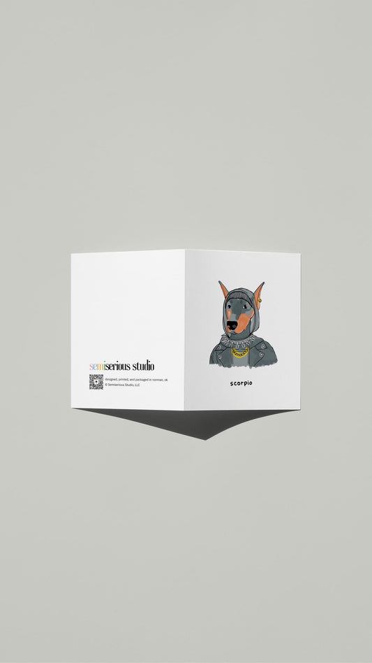 Scorpio Dobermann Birthday card standing open, showing the front artwork and the Semiserious Studio logo on the back