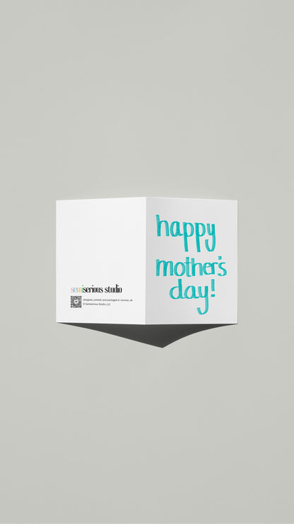 Simple Blue Font Mother's Day card standing open, showing the front artwork and the Semiserious Studio logo on the back