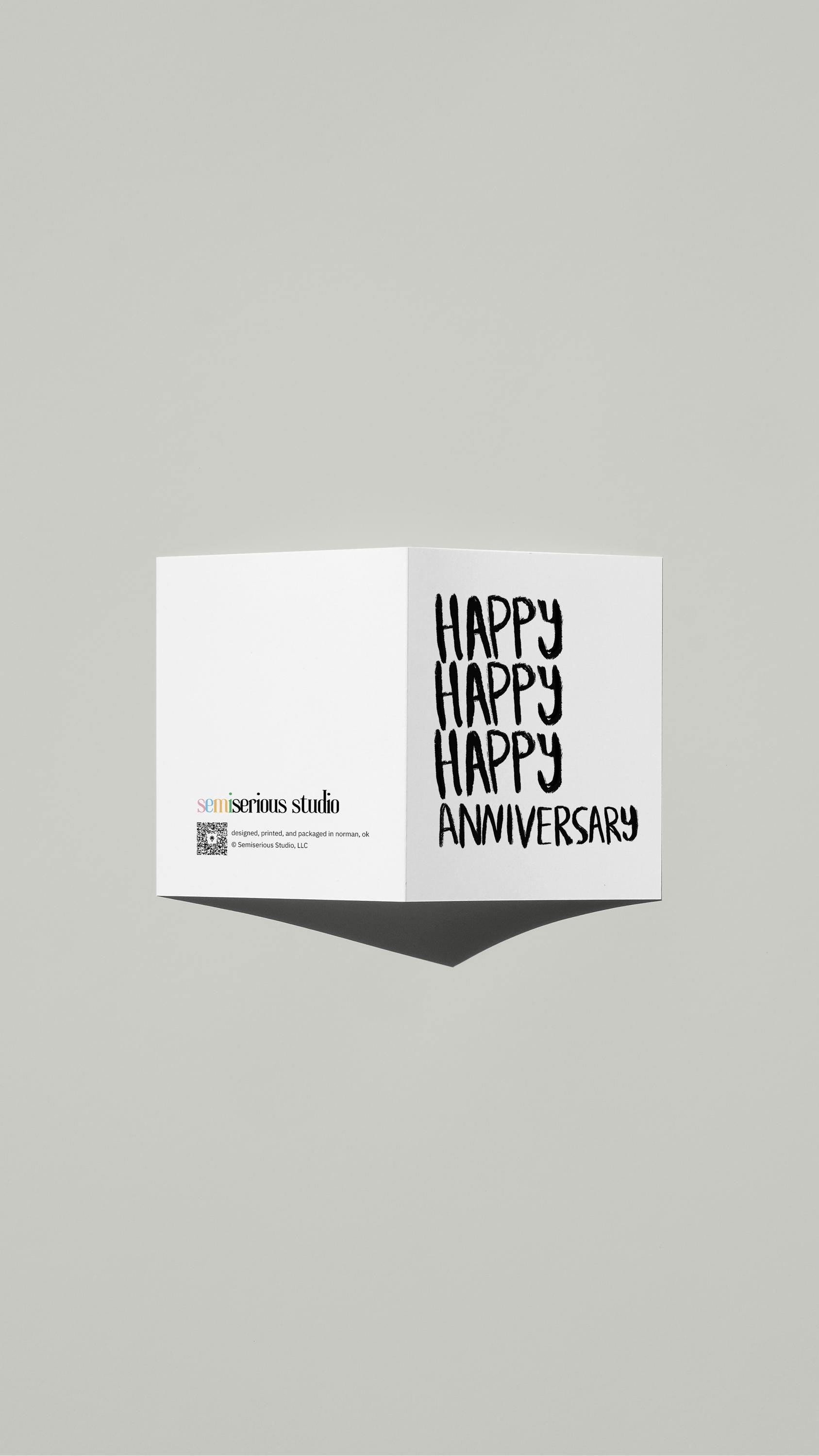 Simple Romantic Anniversary card standing open, showing the front artwork and the Semiserious Studio logo on the back