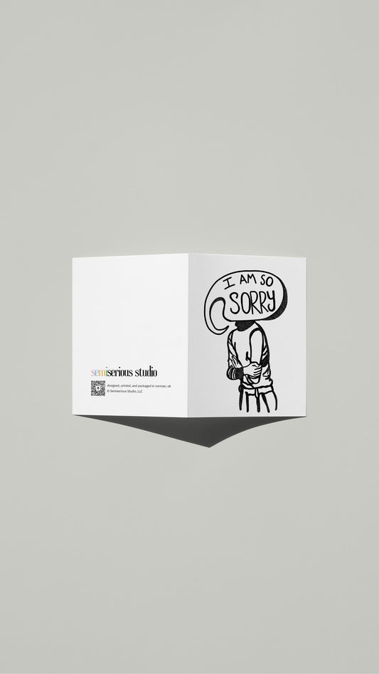 Speech Bubble Apology card standing open, showing the front artwork and the Semiserious Studio logo on the back