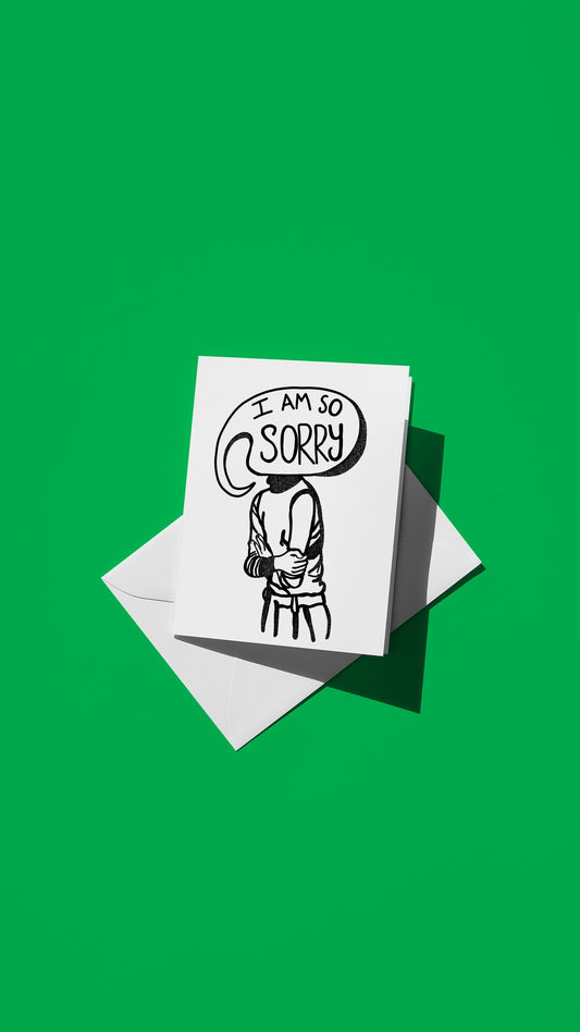 Hand-drawn illustration of a person with a speech bubble head saying "I AM SO SORRY"