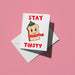 Smiling slice of toast wearing a striped scarf, with red text reading 