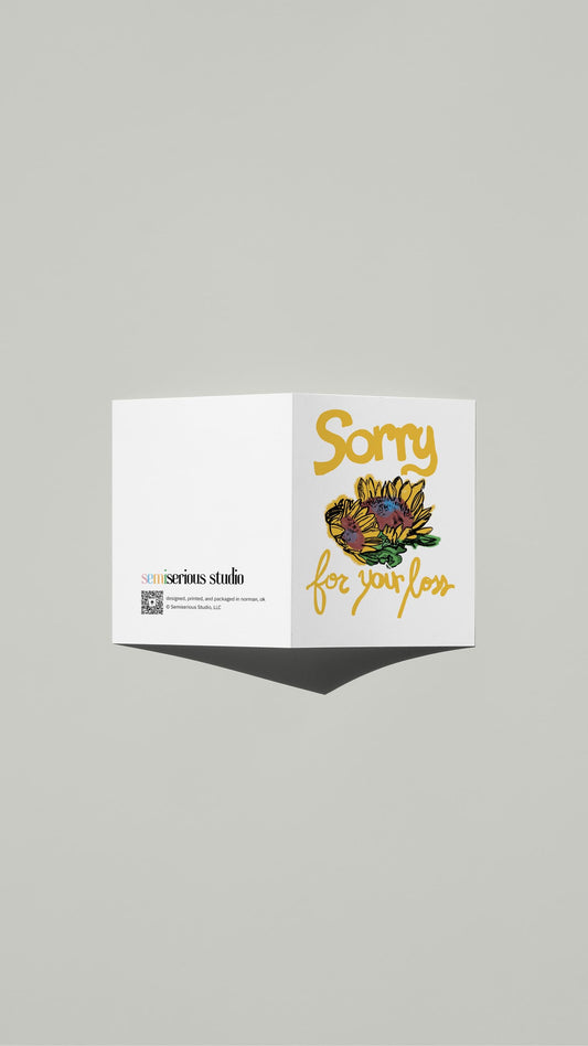 Sunflower Sympathy card standing open, showing the front artwork and the Semiserious Studio logo on the back
