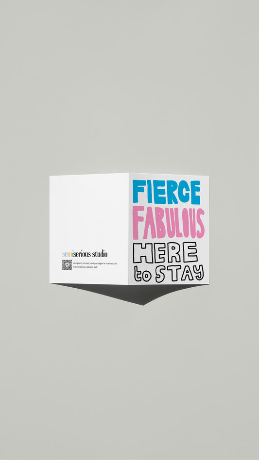 Trans Pride card standing open, showing the front artwork and the Semiserious Studio logo on the back