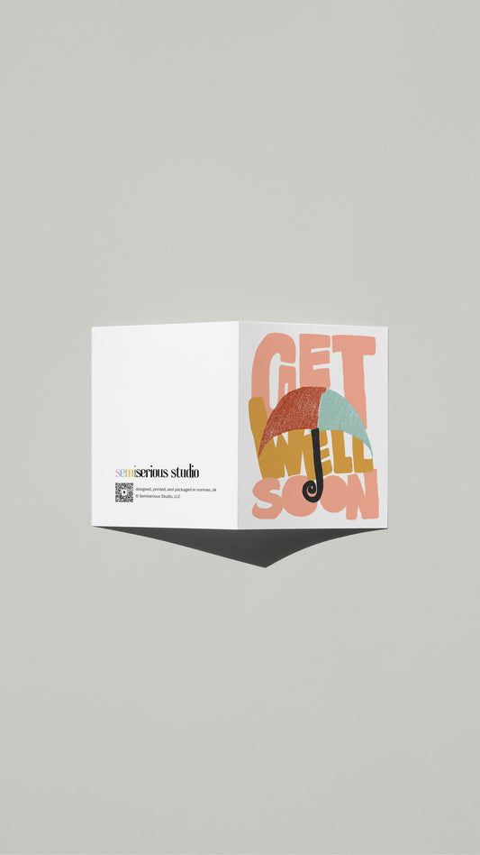 Umbrella Get Well card standing open, showing the front artwork and the Semiserious Studio logo on the back