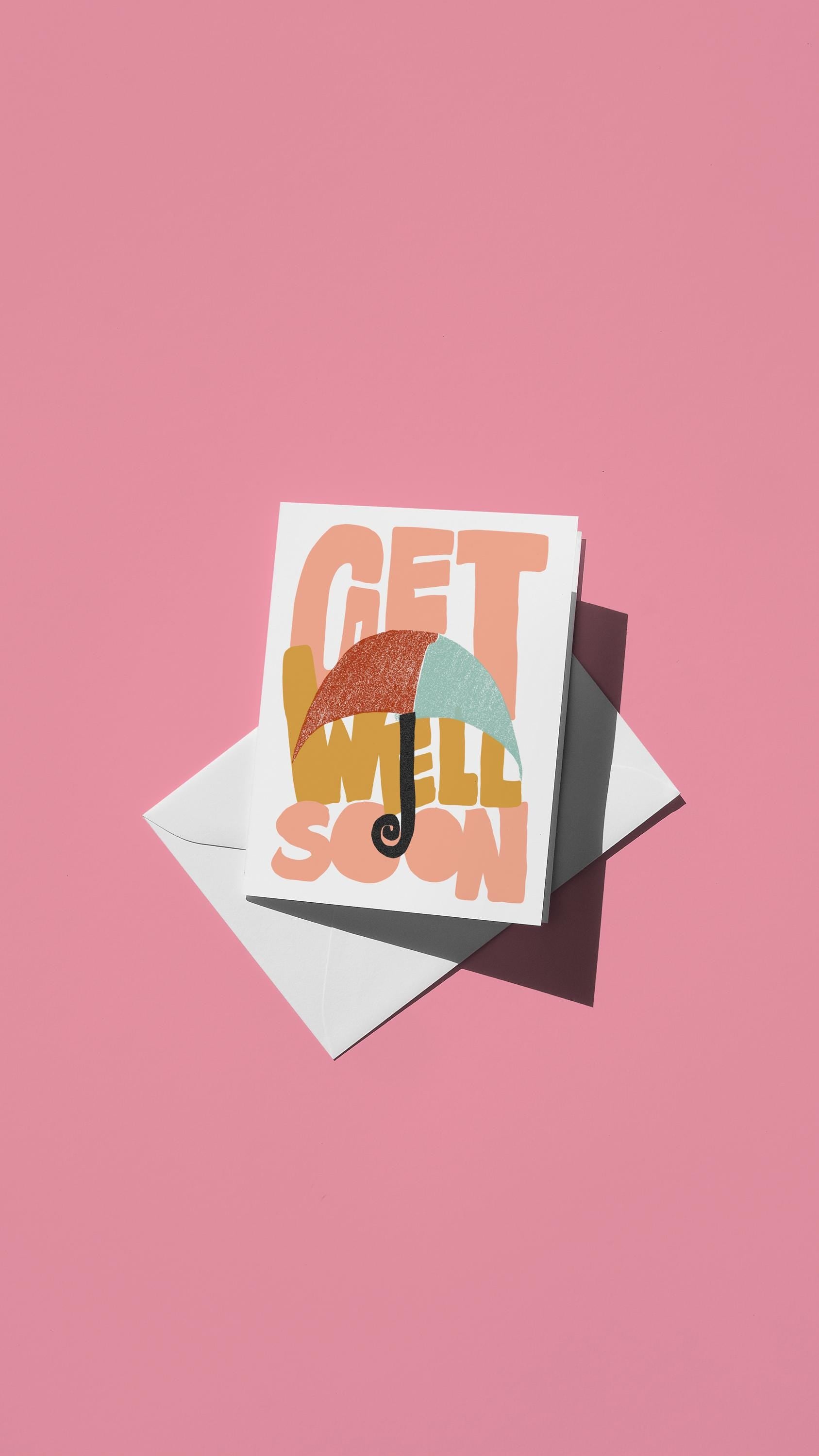 Hand-drawn illustration of an umbrella with the message "GET WELL SOON"