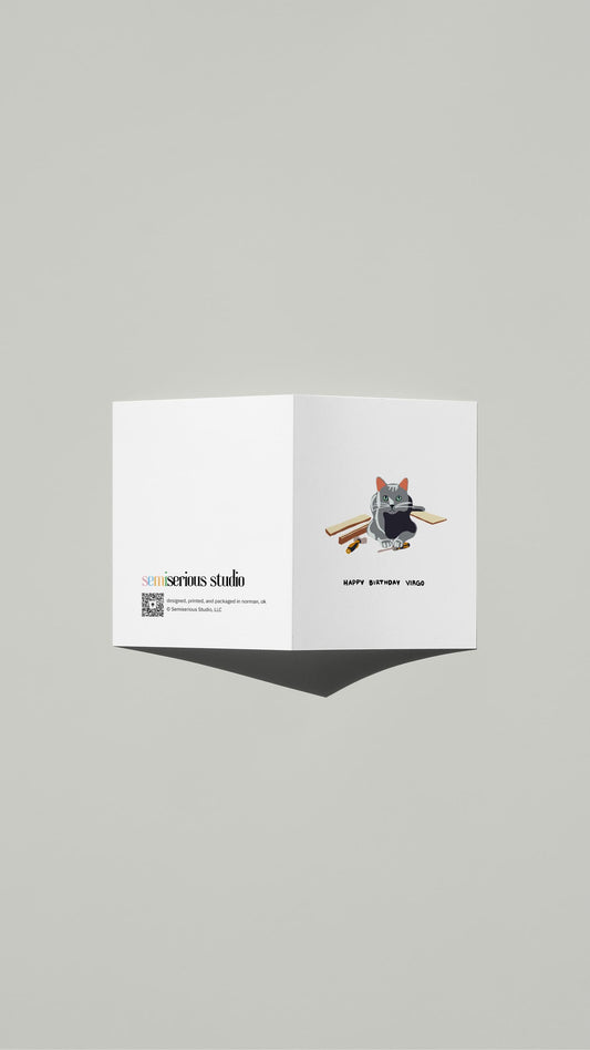 Virgo Russian Blue Cat Birthday card standing open, showing the front artwork and the Semiserious Studio logo on the back
