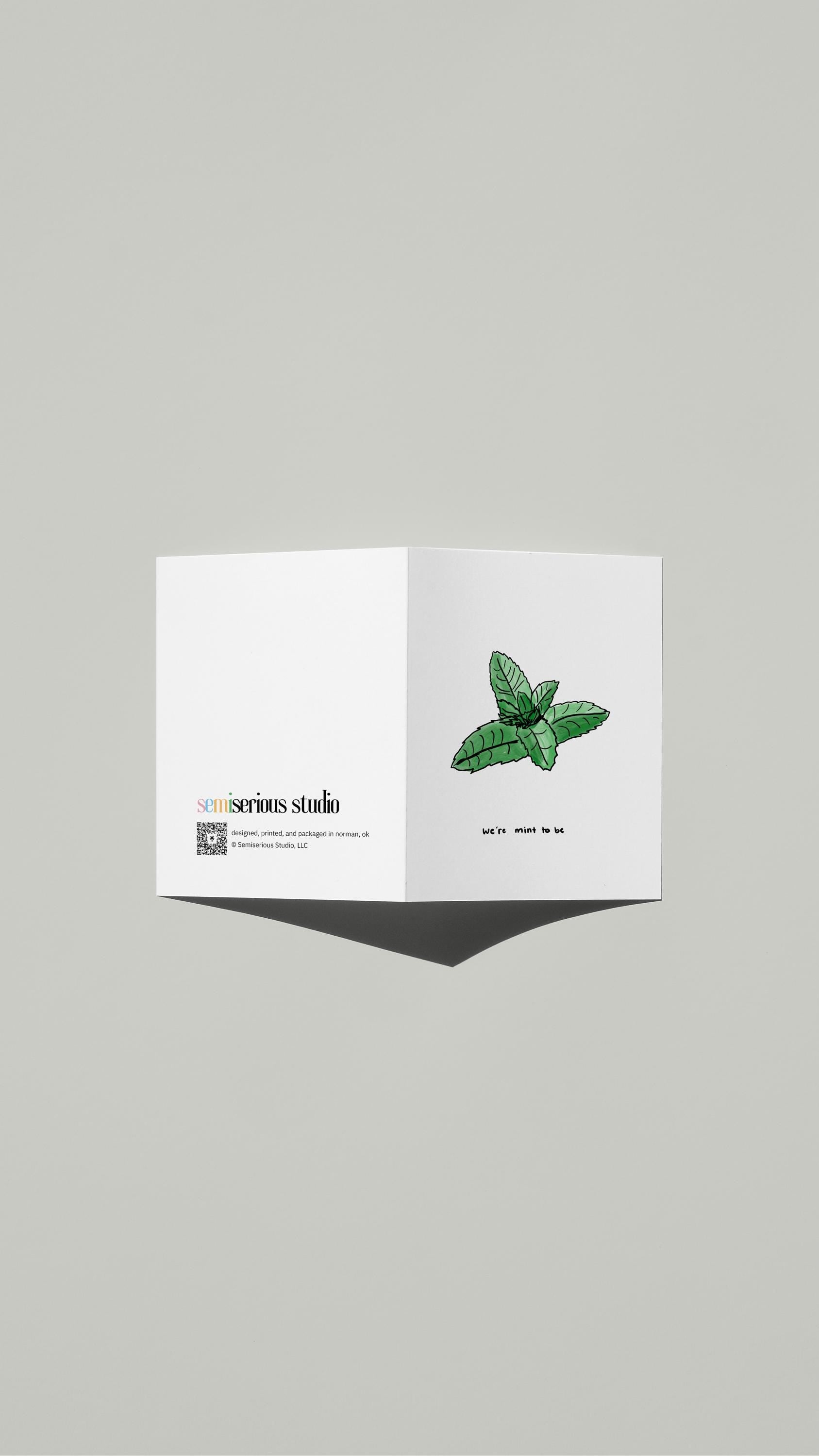 We're Mint To Be Valentine card standing open, showing the front artwork and the Semiserious Studio logo on the back